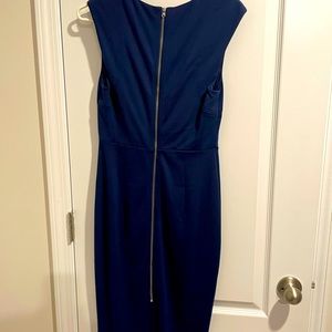 Express form fitting dress. NEVER been worn. I am 5”3 and stops around mid calf.